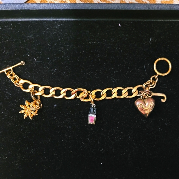 Juicy Couture Jewelry - JUICY COUTURE CHARM BRACELET - EUC - 2 CHARMS -